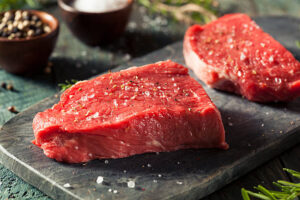 Raw Organic Grass Fed Sirloin Steak with Salt and Pepper